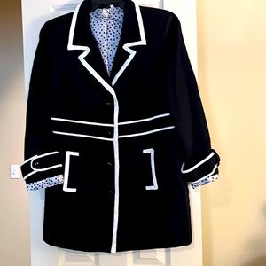 Black jacket with white striped detail.